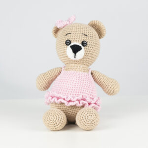 Amigurumi de crochet de 25 cm con forma de oso color beige con ropita color y moñito rosado